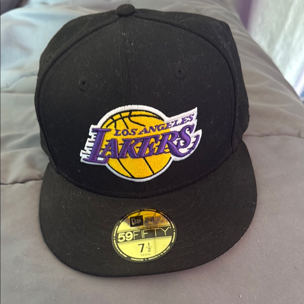 Like new may been wore few time — New Era Black and Purple Party Hat size 7 1/2
